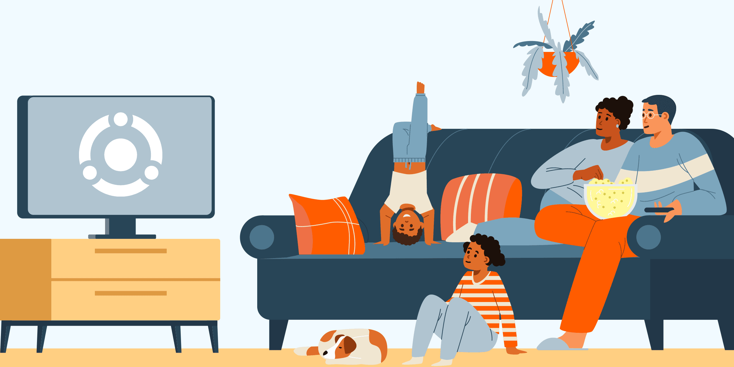 people sitting on a couch watching a tv eating popcorn